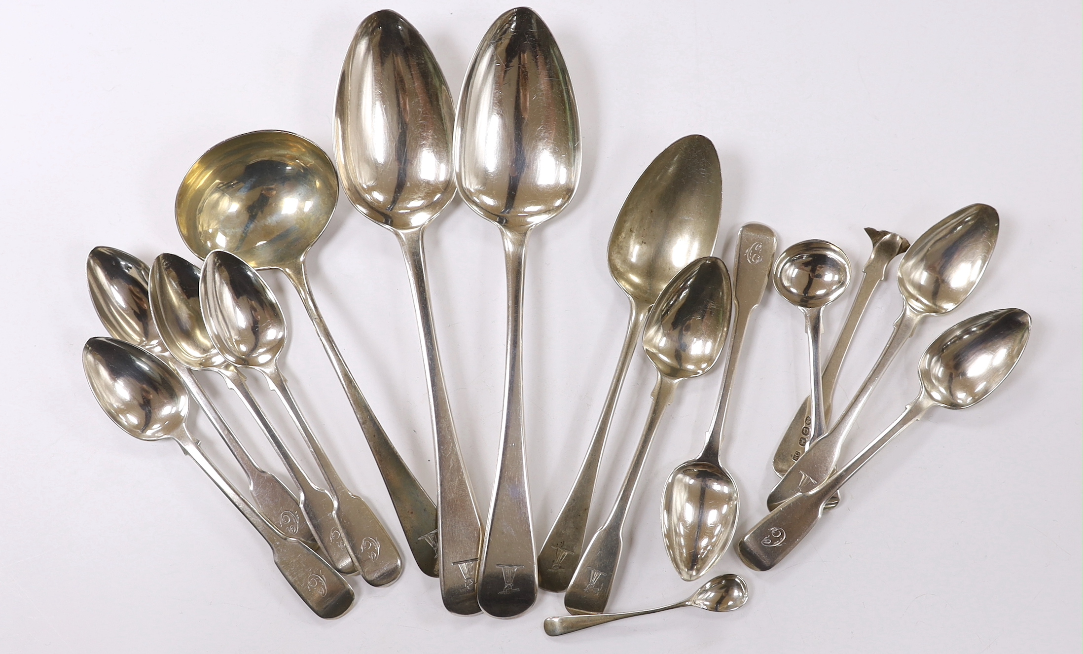 Fourteen assorted 19th century silver spoons, including table, tea and condiment and part of another silver spoons, 12.2oz.